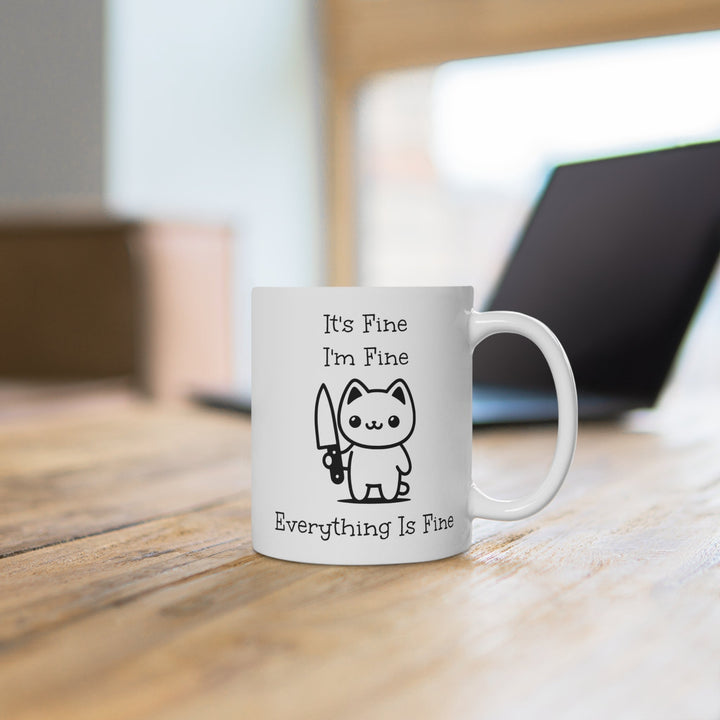 Tasse blanche chat drôle “It’s fine, I’m fine” – Mug kawaii humoristique, cadeau original café & thé - MoodElle